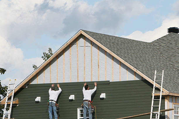 Professional Siding technician working in New Holland, PA